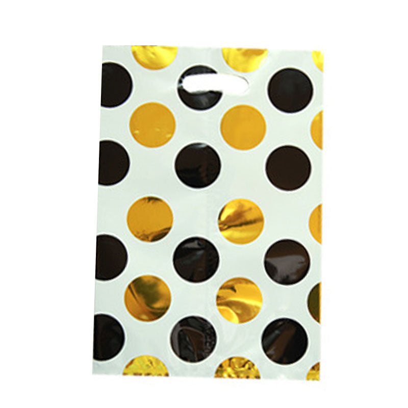 Large polka dots with black and gold foil treat bags to pack these lovely little gifts.