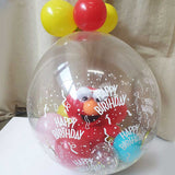 Elmo plush toy in a balloon wrapped as a surprise gift.