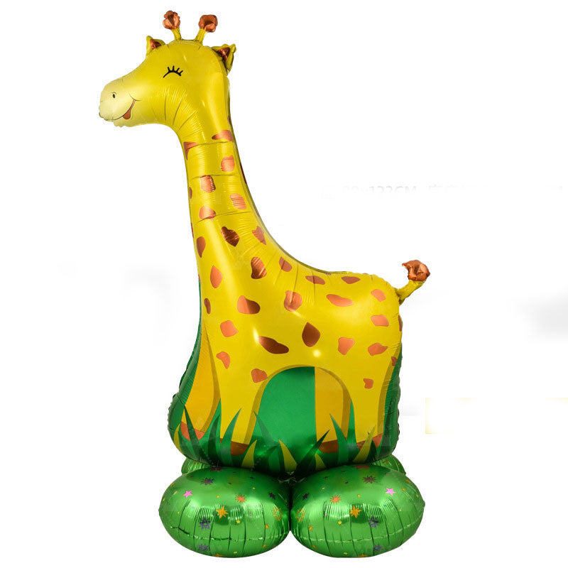 Large Giraffe standing balloon display for the jungle themed birthday party.