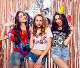 These rose gold foil streamer backdrop are marvellous. See how the girls are enjoying at the bachelorette party!