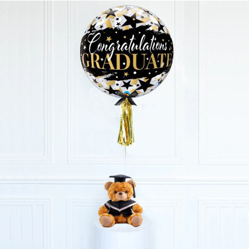 Lovely graduation bear holding on to a bubble balloon for the new graduate..