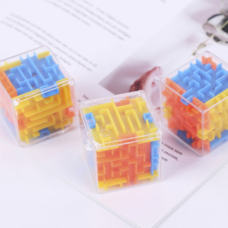 Mini Cube Puzzle Game as party favors. Kids and adult alike will enjoy the game, spending much time figuring out the maze and getting the ball into the slot.