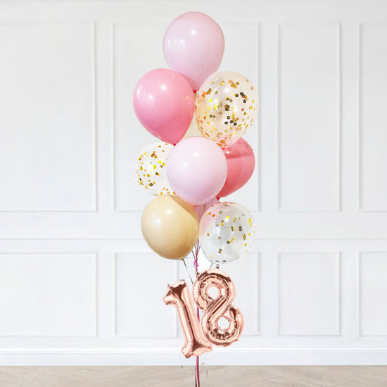 Load image into Gallery viewer, Pink and Gold and Blush coloured balloons with chrome and confetti latex balloons to form the bouquet. Finished with the mini number balloons.
