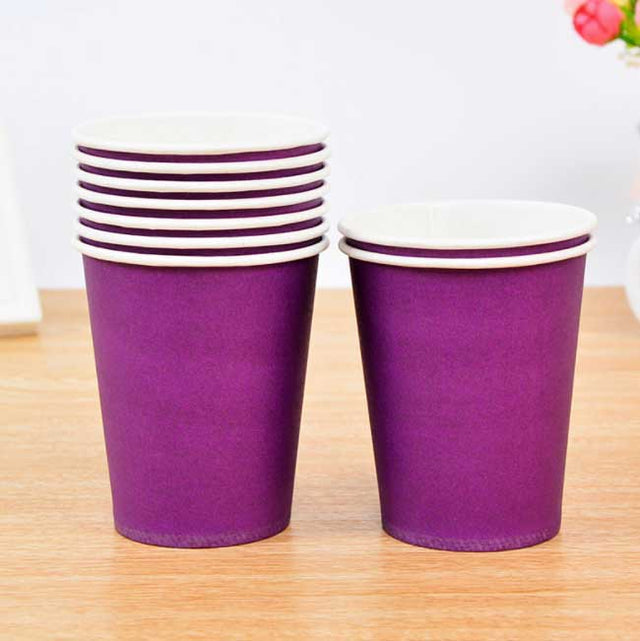 Purple coloured paper cups makes a complete set with the party table decor.