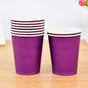 Purple coloured paper cups makes a complete set with the party table decor.
