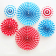Blue and Red paper fans mixed with polkadots and swirls and stripes provides high contrasts of colours.