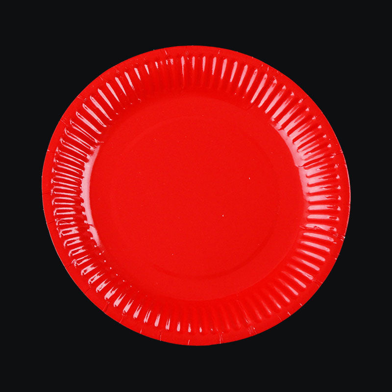 Red party plates for cake dessert serving.
