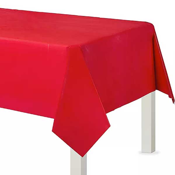 Bright and lively red coloured table cover for birthday party or wedding parties