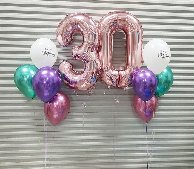 Forming 30th Birthday decorations with Rose Gold Number Helium Balloons and delightful chrome latex balloons