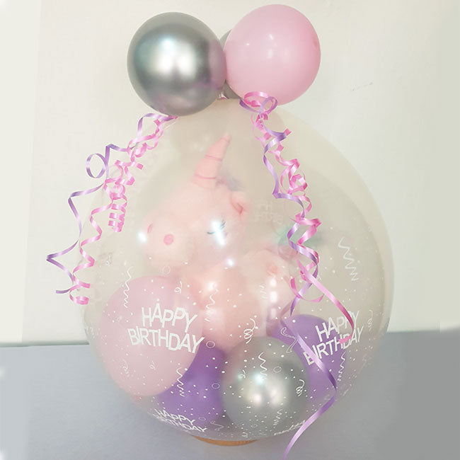 Unicorn soft toy wrapped in a balloon for a marvellous and impressive birthday gift or get well soon present.