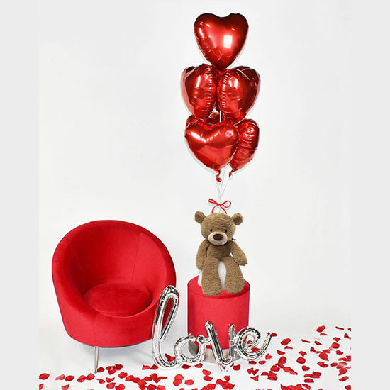 Red Hot heart shaped balloons bouquet that comes with a lovely Gund Bear for a marvellous surprise Valentine's Day present!