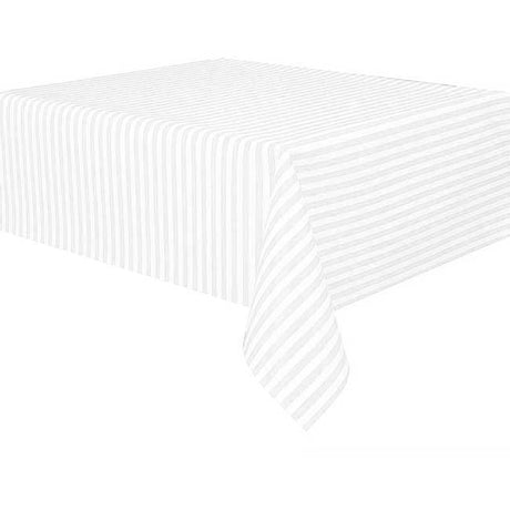 Clean and bright look on the cake table with a white striped table cover.